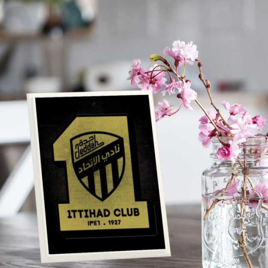 لوحة اهداء بشعار الاتحاد