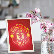 لوحة اهداء بشعار مانشستر يونايتد